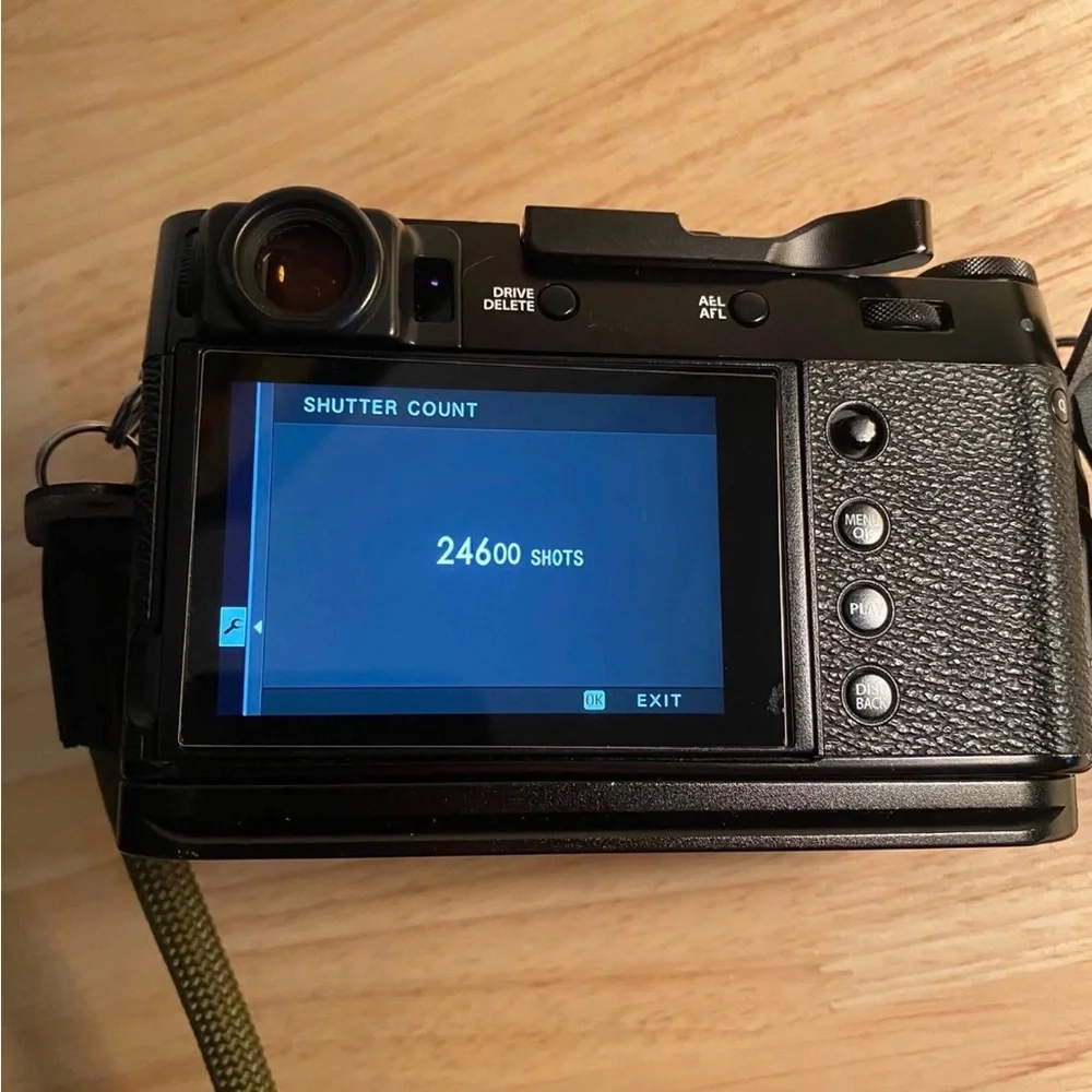 Fujifilm Black Camera with Olive Strap